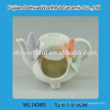 Butterfly series white porcelain oil burner in teapot shape